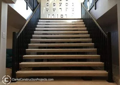 completed basement stair by clarke construction projects