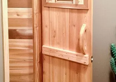 Sauna door built by clarke construction projects