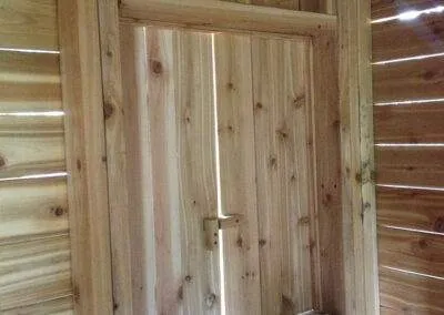 Tree house window and shutters built by clarke construction projects