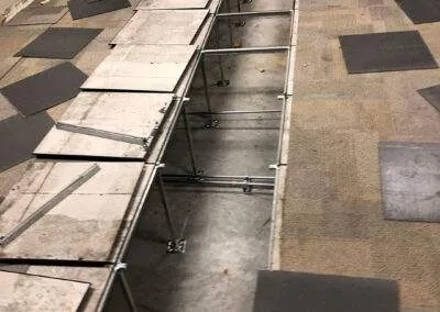 Progress - installation of raised access flooring by Clarke Construction Projects