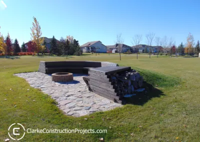 custom built campfire seating area by clarke construction projects