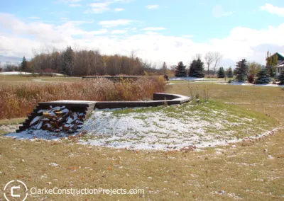 custom made wood shelter with fire pit