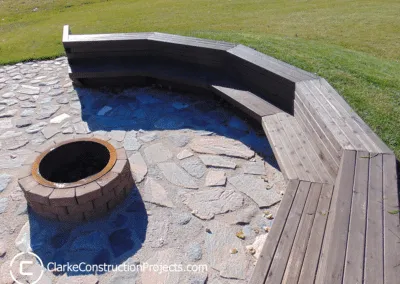 outdoor bench with fire pit built by clarke construction projects