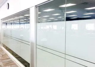 Glass wall installation by clarke construction projects